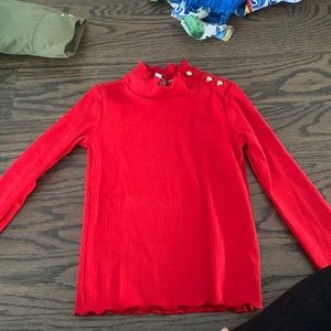 Red turtleneck